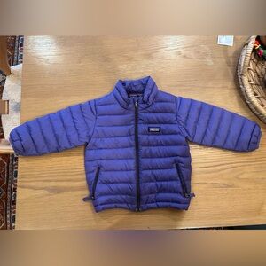 Gently used Patagonia jacket in purple.